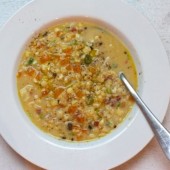 Sweet corn soup with pancetta and green garlic